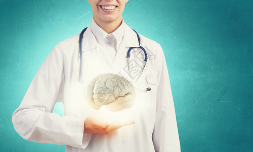 保护大脑心理健康用听诊器手中的大脑女医生背景