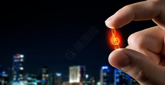 手指的音乐音符近距离观看男手与手指音乐标志背景图片