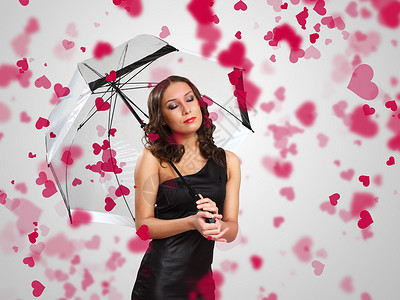 伞下女孩漂亮的女人伞下,周围红色的花瓣背景