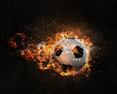 球火中燃烧足球火焰黑暗的背景下火焰背景图片