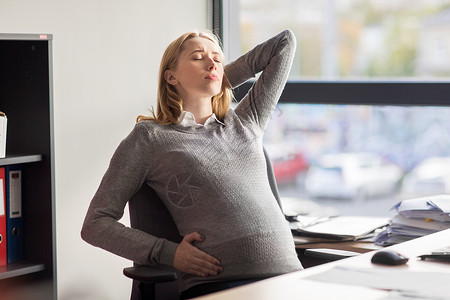 怀孕,生意,妊娠人的疲惫的怀孕女商人办公室工作时感恶心图片