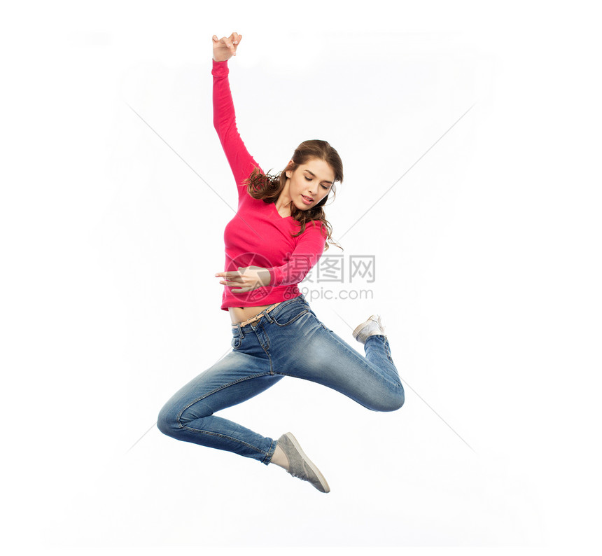 幸福,自由,运动人的微笑的轻女人白色的背景上跳跃图片