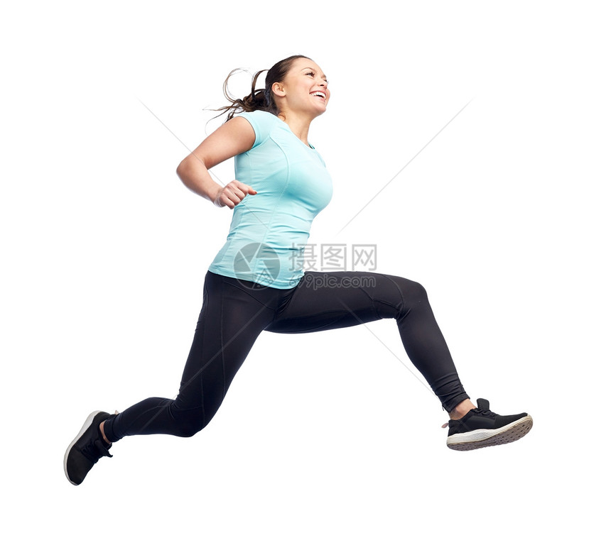 运动,健身,运动人的快乐的微笑轻女人空中跳过白色的背景图片