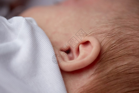 儿童,人护理婴儿耳朵背景