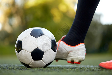 特写镜头运动员体育,足球人足球运动员球场上玩球足球运动员足球场上打球背景