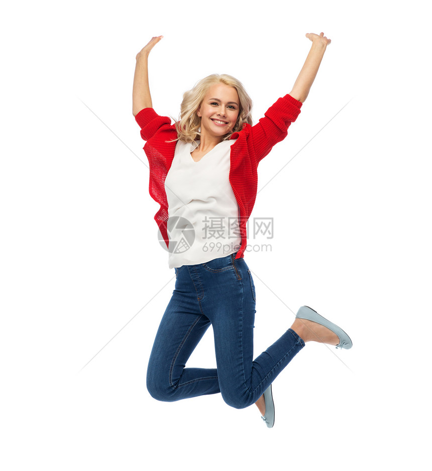 幸福,自由,运动人的微笑的轻女人空中跳跃微笑的轻女人空中跳跃图片