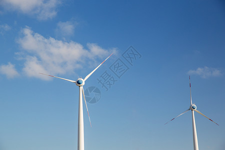 可再生能源技术电力蓝天上的风力涡轮机蓝天上的风力涡轮机图片