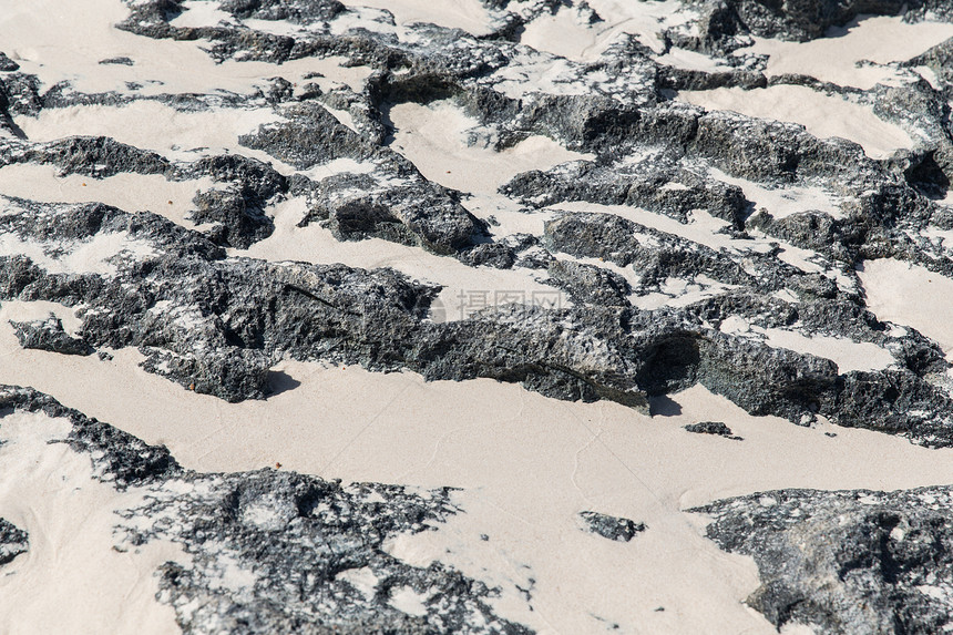 背景纹理用沙子封闭石头火山岩表用沙子封闭石头火山岩图片