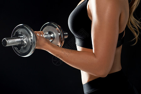 运动,健身人的近距离的轻运动妇女锻炼哑铃亲密的运动女人用哑铃锻炼图片