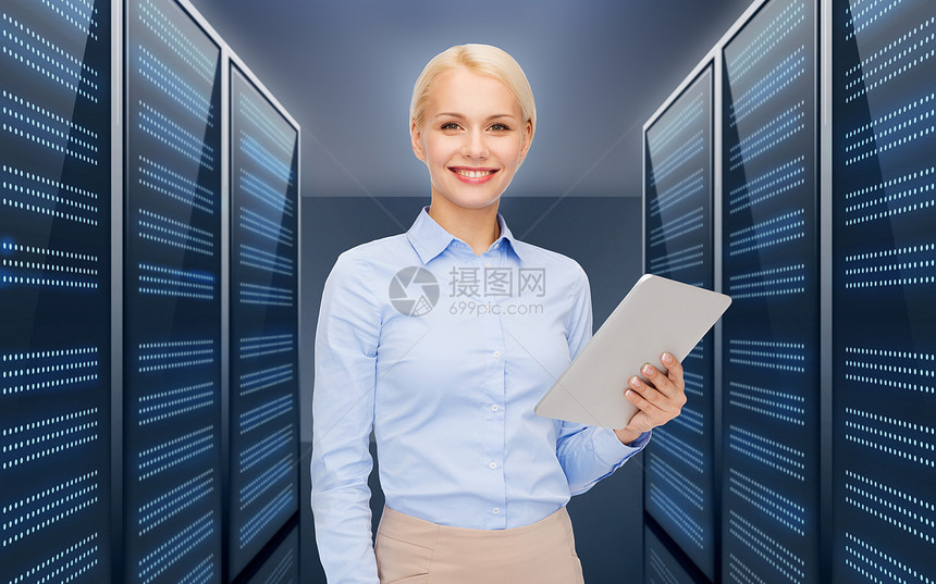 商业,人技术快乐微笑的女商人持平板电脑未来的服务器室背景女商人带着平板电脑服务器机房上空图片