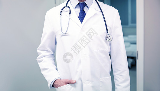 医疗保健职业人医学理念医院用听诊器近距离接触穿白大衣的医生医院用听诊器医生背景图片