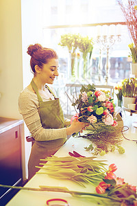 人,商业,销售花卉快乐微笑的花店妇女花店微笑的花店女人花店图片