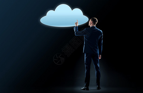商业,人技术商人穿着西装触摸虚拟云全息图黑色背景商人触摸虚拟云全息图图片