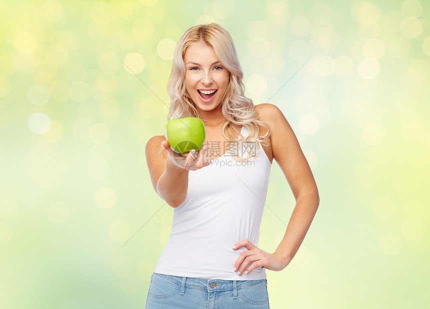 健康的饮食,饮食人的快乐的美丽轻女人与苹果夏季绿灯背景快乐的美丽的轻女人带着绿色的苹果图片