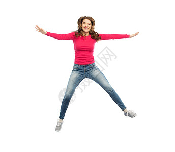 幸福,自由,运动人的微笑的轻女人白色的背景上跳跃微笑的轻女人空中跳跃图片