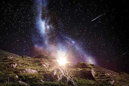自然天文学岩石景观夜空与流星背景夜空上的岩石景观图片