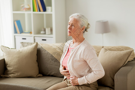 老健康问题人们的观念老妇女家里胃痛老妇女家胃痛高清图片