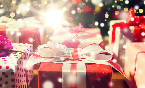诞节,假日,礼物,新庆祝礼品盒诞树灯诞树灯上礼品盒背景图片