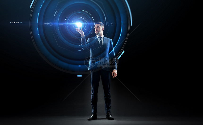 商业,增强现实,人未来的技术适合黑色背景上用虚拟投影的商人穿着虚拟投影西装的商人图片