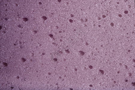 紫色气泡紫色浴海绵的质地背景
