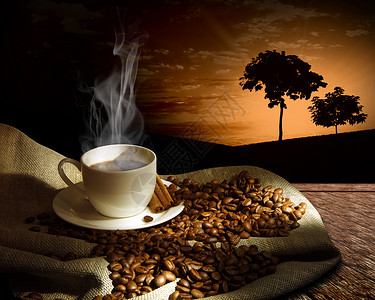 热气腾腾的咖啡,肉桂棒些咖啡豆平静的生活图片