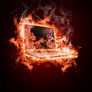 笔记本电脑黑色背景下明火背景图片