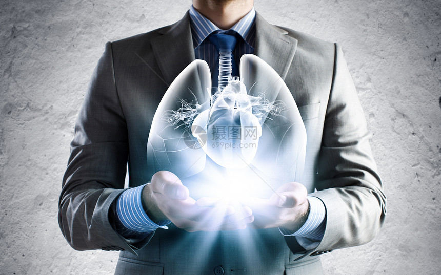 医学创新特写商人手中着肺的图像图片