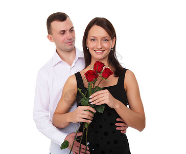 个爱心的男人为他的女人着朵红玫瑰图片