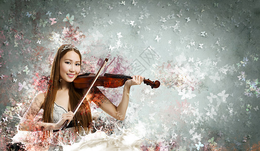 女小提琴手轻漂亮的亚洲女人拉小提琴轻的天才图片