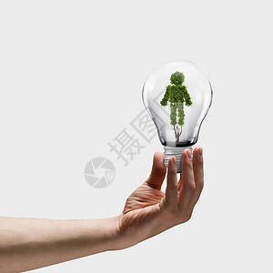 生态人的手着灯泡,植物形状像人图片
