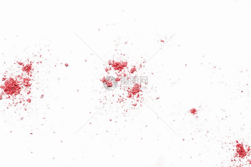 散落的粉末白色背景上粉红色粉末的抽象图像图片