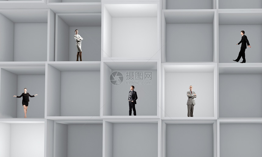 商业队商业人士站立方体中的微型模型图片