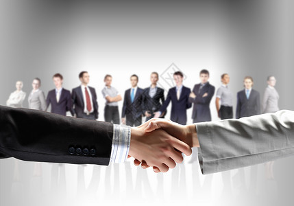 商务握手的形象商务握手白色背景站立的商人图片