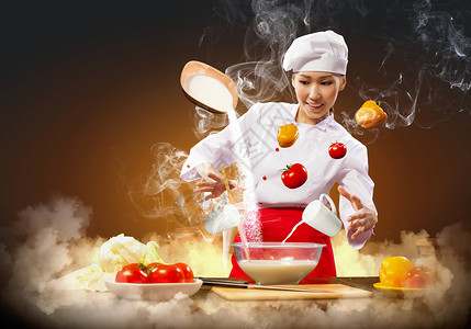 亚洲女烹饪魔术亚洲女烹饪与魔术的颜色背景图片