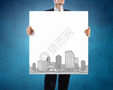 开发项目的介绍商人高举城市建设理念的背景图片