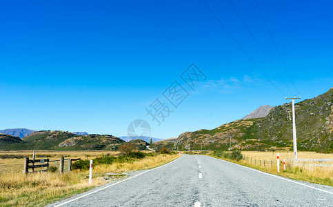 遥远乡村道路风景如画新西兰阿尔卑斯山道路的自然景观背景