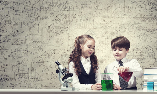 实验室实验可爱的女孩男孩化学课制作测试背景图片