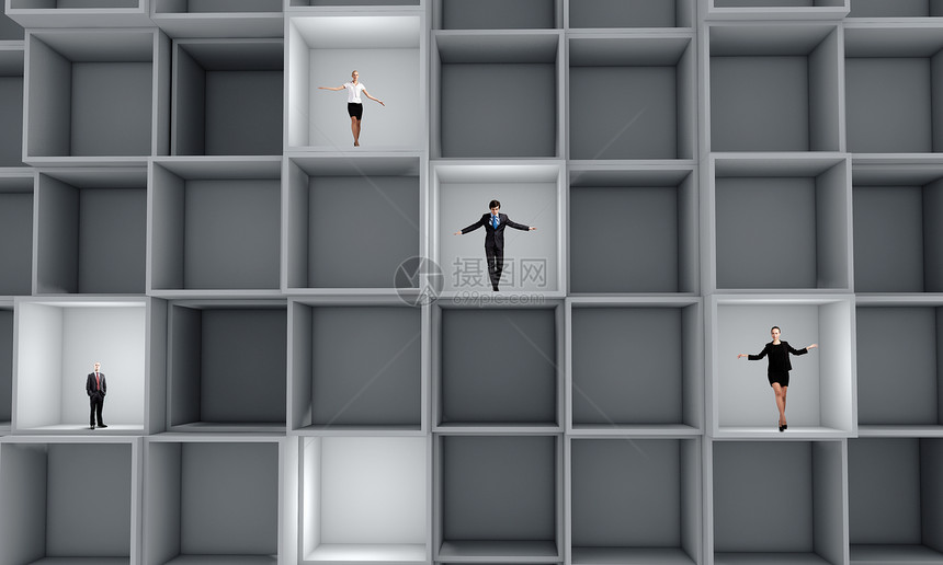 商业队商业人士站立方体中的微型模型图片
