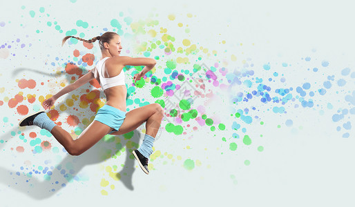 运动女跳跃的形象运动女孩彩色点背景下跳跃的形象图片