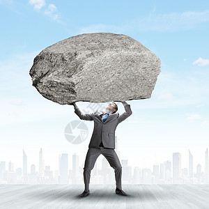 推石头迫眉睫的问题权势的商人头顶着巨大的石头背景
