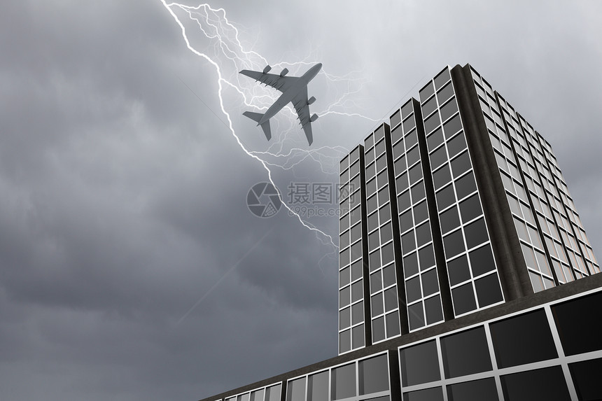 城市上空的飞机暴风雨的天空中,飞机摩天大楼上方飞行的底部视图图片