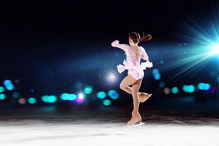 花样滑冰运动员小女孩花样滑冰小女孩运动场花样滑冰背景