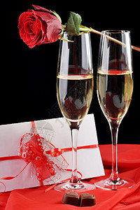 美丽的玫瑰,香槟信与丝带图片