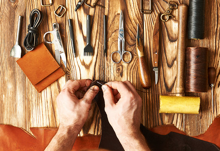产品手册整套用手工工具与皮革工作的人背景