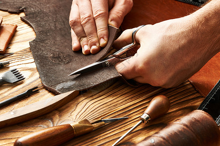 产品手册整套用手工工具与皮革工作的人背景
