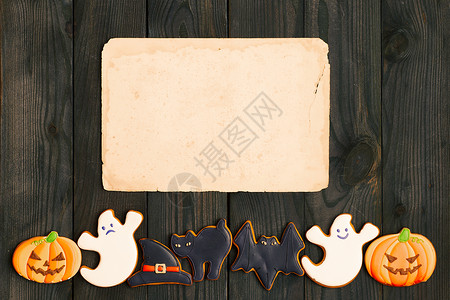空白的旧纸姜饼饼干黑暗的木制背景万节邀请高清图片