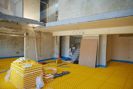 建建筑中的黄色地板下加热高清图片