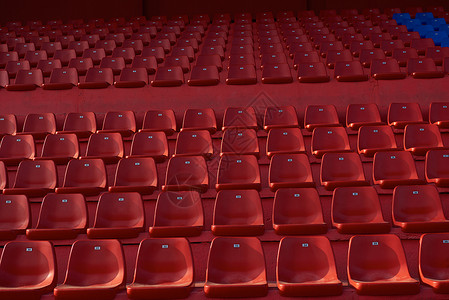 剧院椅红色体育场座位排壁纸椅空背景