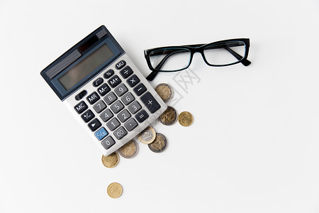 商务,金融,货币簿记计算器,眼镜欧元硬币办公室桌子上图片