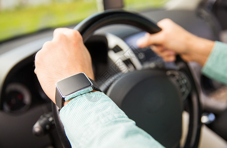 交通,商务旅行,技术,时间人的近距离的人与手表驾驶汽车图片